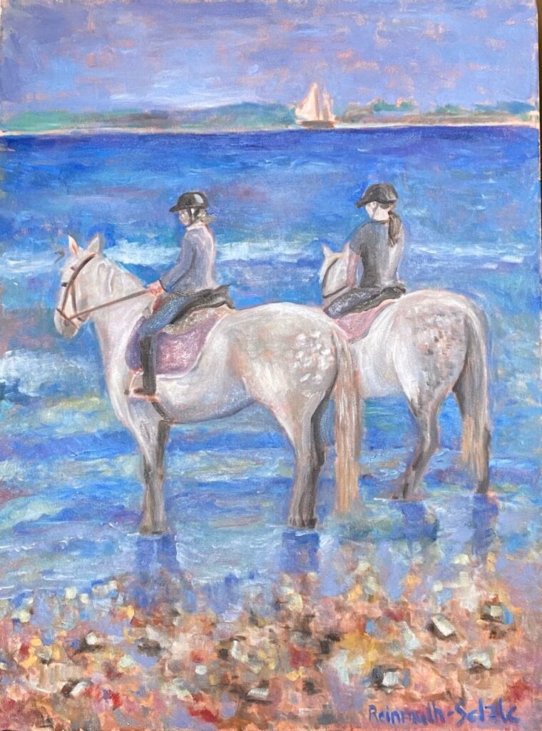 Zwei Mädchen mit Pferden an der Ostsee
